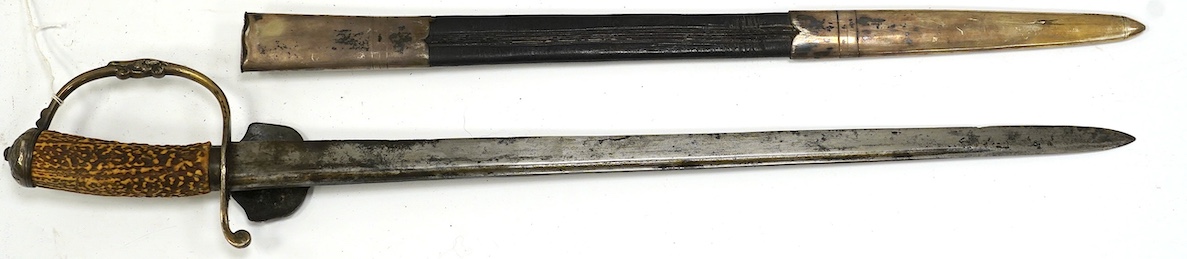 A silver mounted Continental hunting hanger, side guard and knuckle bow with raised decoration, stag horn grip, leather scabbard with later engraved silver mounts, blade 48.5cm. Condition - good